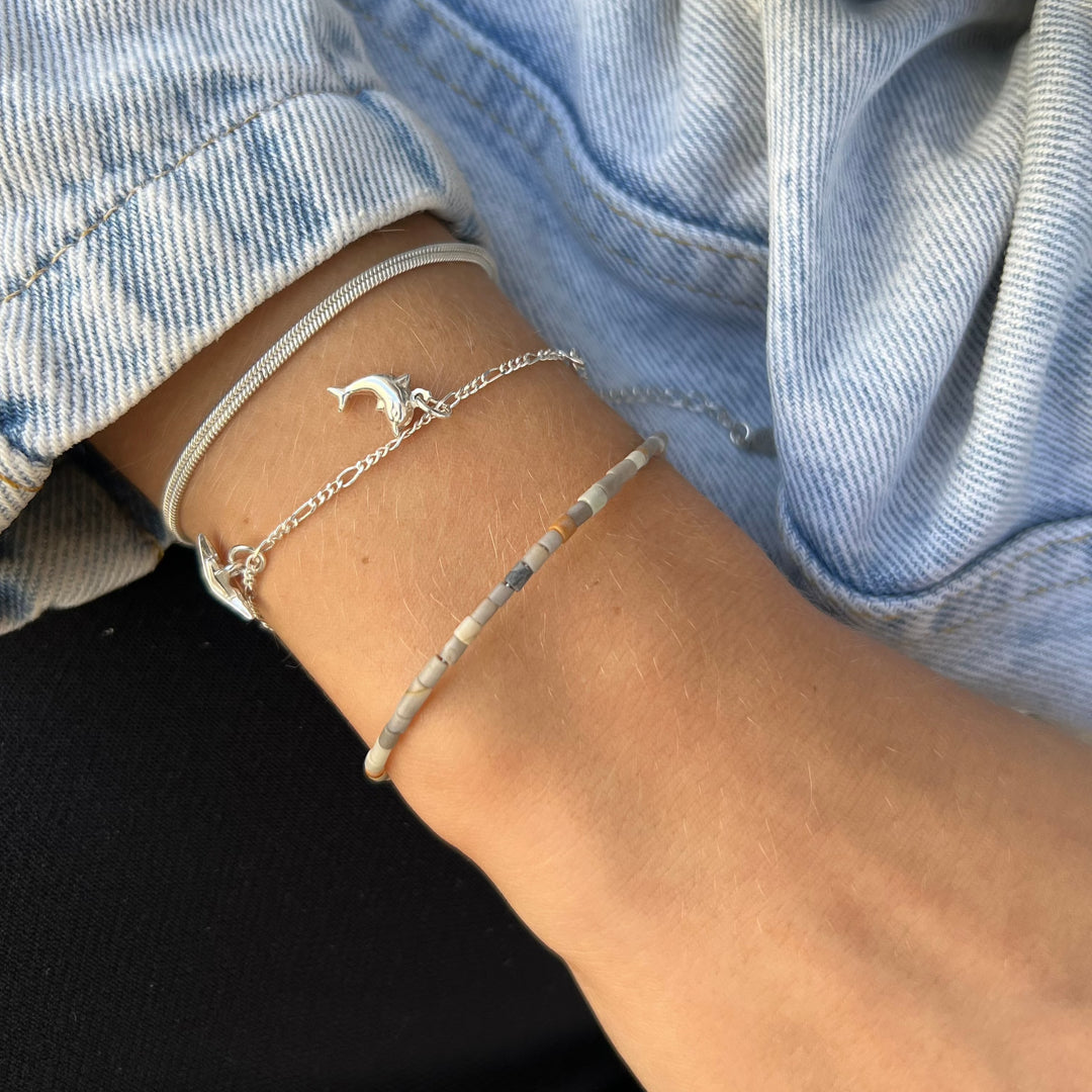 Find Armbånd, lys broget jaspis rørperler, 16 - 20 cm hos Beadhouse of Copenhagen i dag, med en altid hurtig levering!