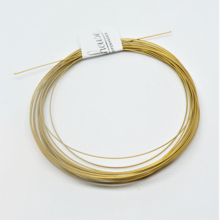 Find Tigerwire, japansk lys guld, stål, 0,32 mm hos Beadhouse of Copenhagen i dag, med en altid hurtig levering!