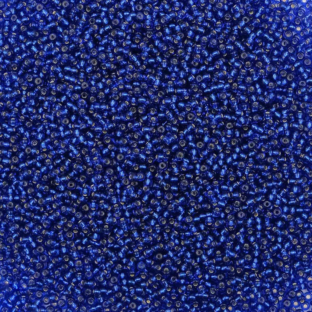 Blå glasperler, preciosa, silverlined dark sapphire 4/0 7 gram Preciosa