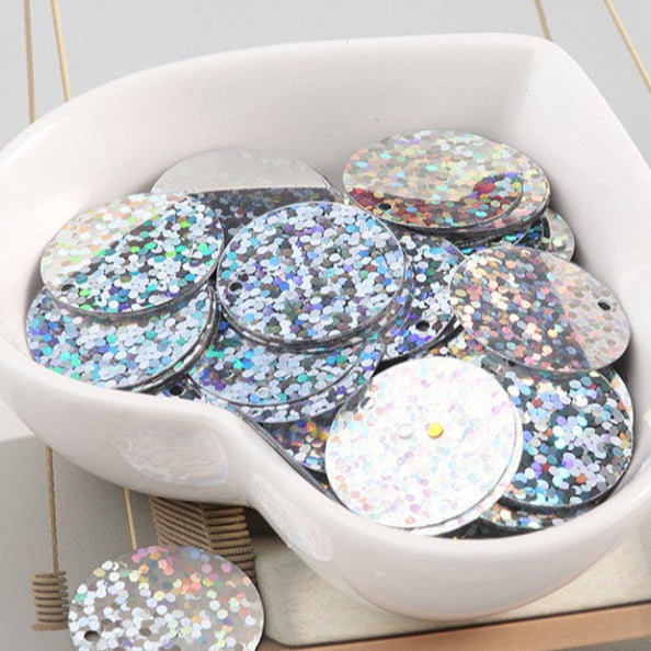 Find Pailletter, runde, sølv disco 15 mm, med regnbueskær, 10-40g, flere varianter hos Beadhouse, til altid hurtig levering og gode priser