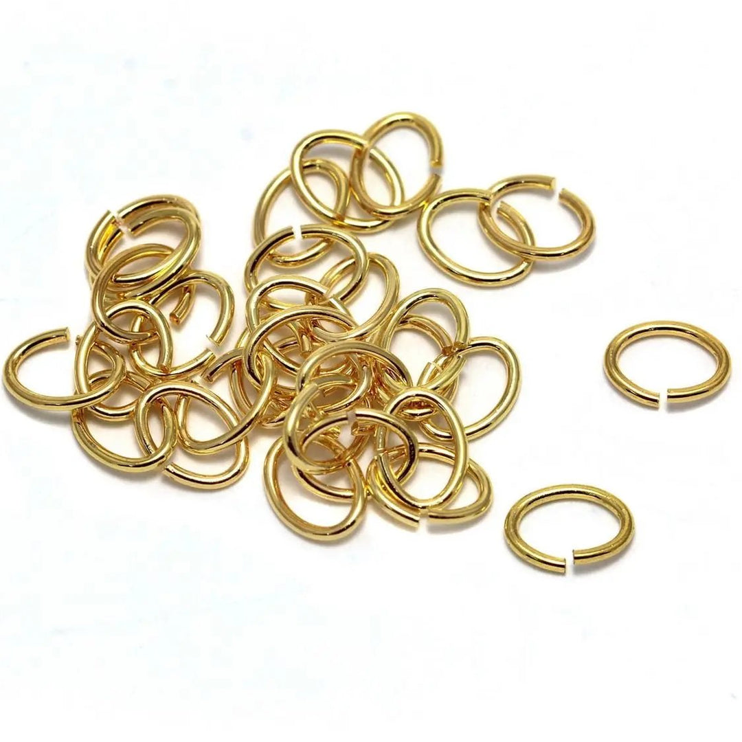 Øskner, ovale åbne messing forgyldt, 6 x 4 x 1,0 mm 
