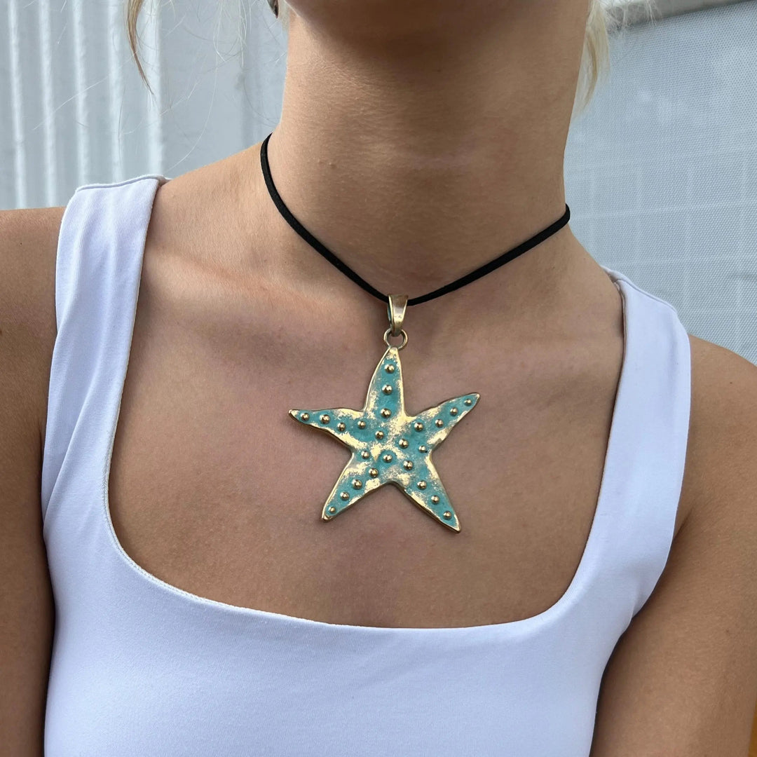 Vedhæng, søstjerne, forgyldt el. forsølvet messing, 69 mm Tax