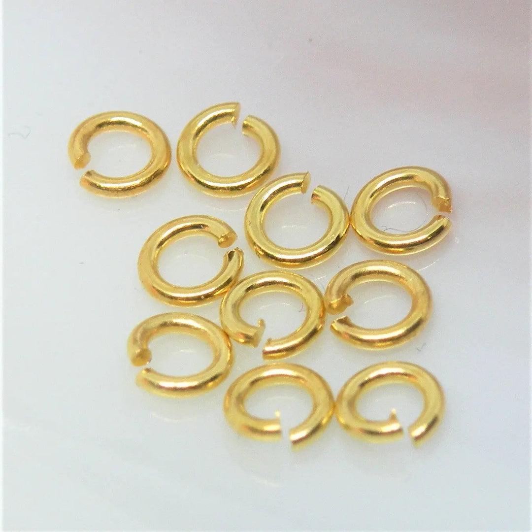 Øskner, åbne, messing forgyldt, 5x0,8mm Tax
