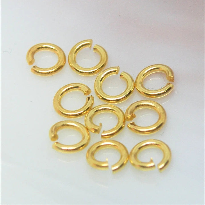 Øskner, åbne, messing forgyldt, 5x0,8mm Tax