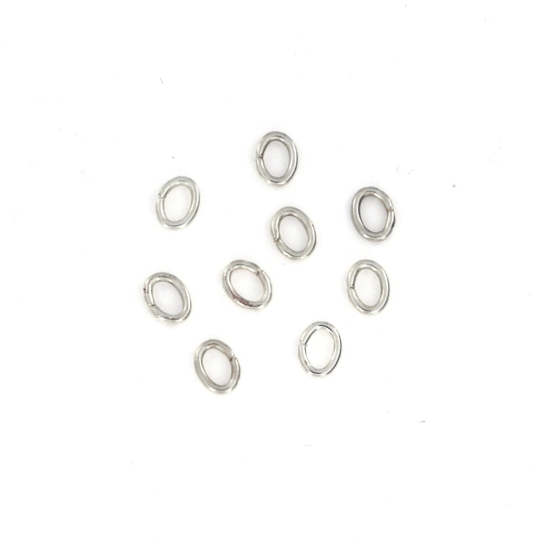 Ovale åbne øskner, forsølvet messing, 4,5 x 6,0 x 0,9mm. 10 stk. Fritz